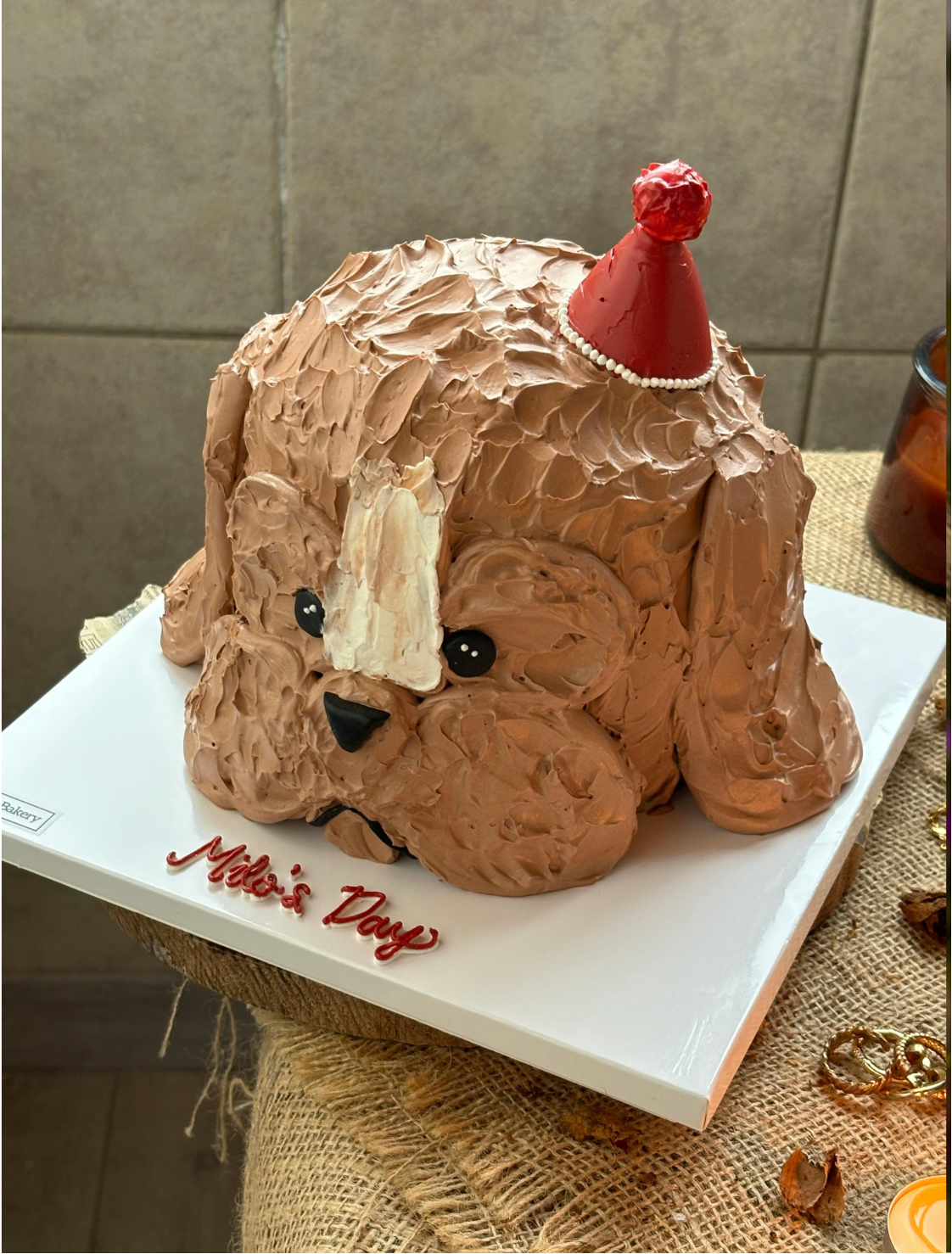 Custom dog cake from Super Pet Food, shaped like a dog, made with wholesome ingredients